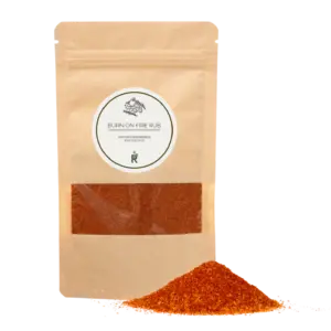Das Bild zeigt einen Haufen Burn on FIre Rub vor einer Verpackung.